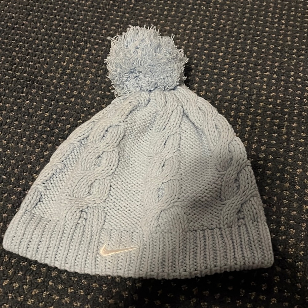 Nike fleece lined Pom Pom hat in baby blue cotton/acrylic blend w poly lining